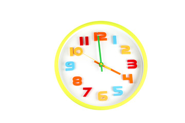 Colorful clock in telling time of four o'clock.