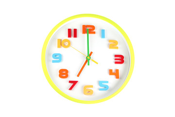 Colorful clock in telling time of seven o'clock.
