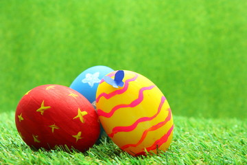 Easter eggs on grass background