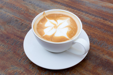 Hot Coffee cup on Wooden Table