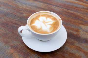 Hot Coffee cup on Wooden Table