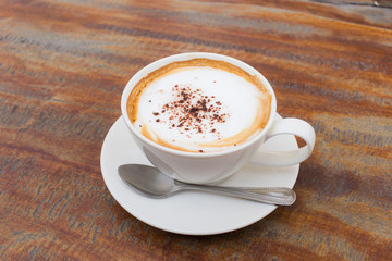 Hot Coffee cup on Wooden Table