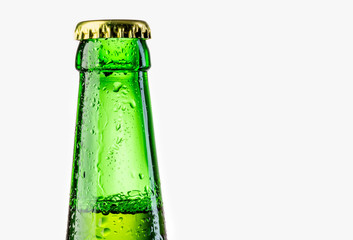 Green beer bottle with water drops