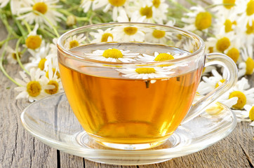 Herbal tea with chamomile flowers