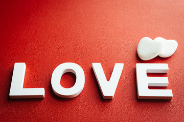 Love word and hearts decorative background