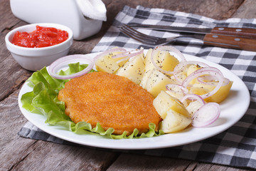 Schnitzel with young boiled potatoes