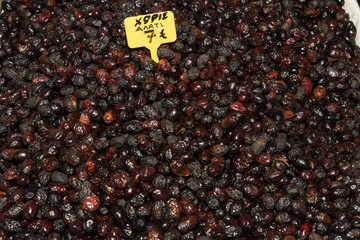 Wrinkled unsalted greek black olives.