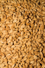 Shelled dry almonds on a market stand
