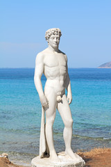 Ancient greek statue of a young athlete - 62140222