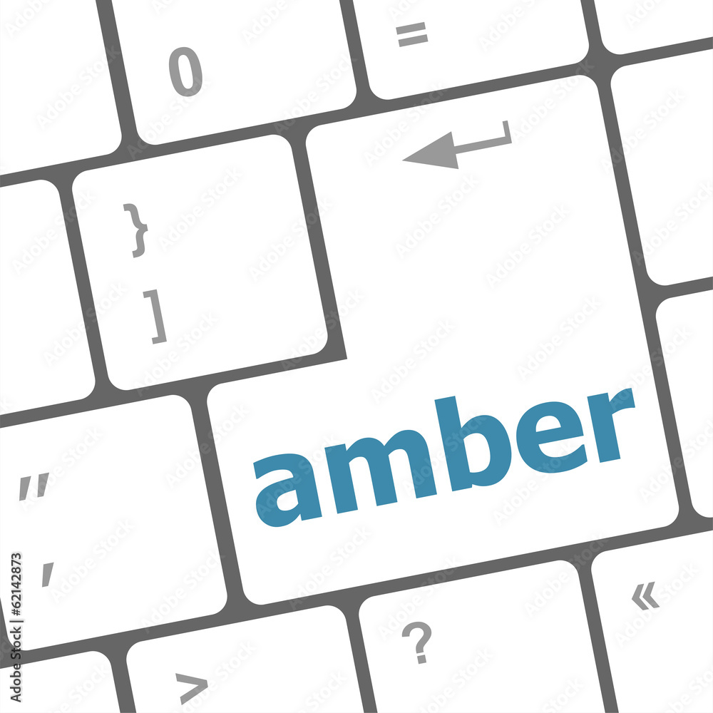 Poster amber button on modern computer keyboard key