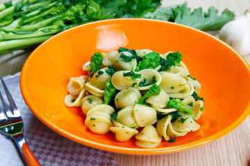 orecchiette pasta with broccoli rabe, turnip tops