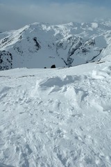 Snow and peaks in Alps in winter