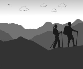 Mountain climbing, hiking couple with rucksacks silhouette