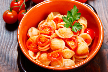 orecchiette pasta with tomato sauce.