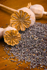 poppy seeds on wooden table