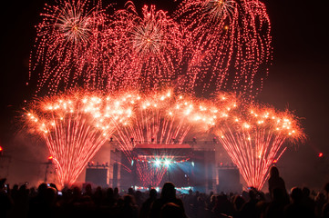 Fireworks above the stage during concert - obrazy, fototapety, plakaty