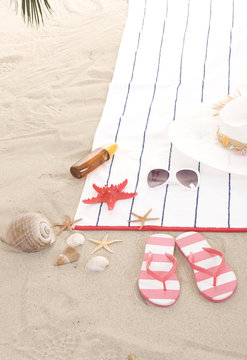 beach items on sand for fun summer holiday