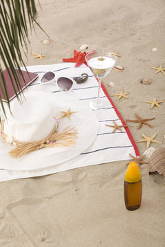 beach items on sand for fun summer holiday