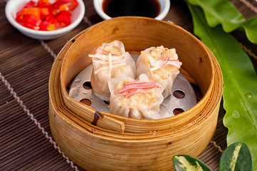 Dim sum in bamboo steamer