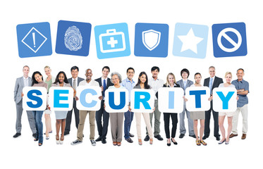 Multi-Ethnic Group Of  People Holding The Word Security
