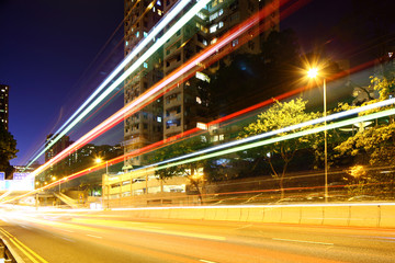 Fototapeta na wymiar Busy traffic trail in city at night