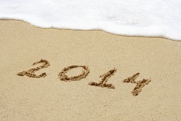Conceptual text sand on beach