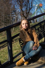 Young beautiful girl on a walk in the country