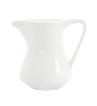 Side of ceramic milk jug on white background.
