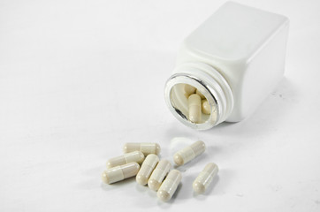 capsule medicine on white paper