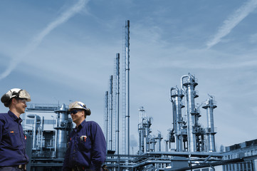 oil-workers inside chemical refinery