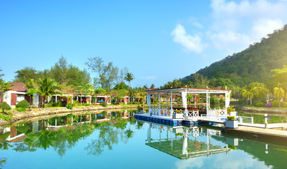 Fototapeta na wymiar Green garden with lake. Klong Prao Beach