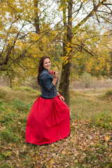 Young beautiful girl on a walk in the country