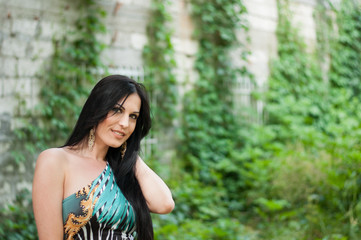 Young beautiful girl on a walk in the country