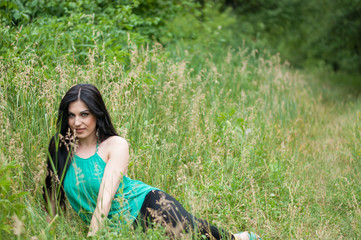 Young beautiful girl on a walk in the country