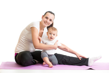 Fototapeta na wymiar mom with baby doing gymnastics