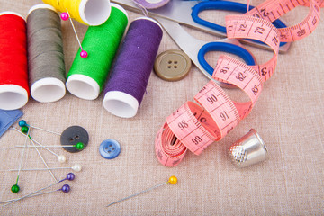 Tools for needlework, thread, scissors, pins, measure type and