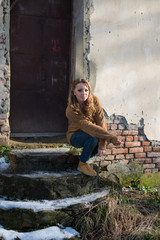 Young beautiful girl on a walk in the country