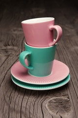 Coffee cups on old table