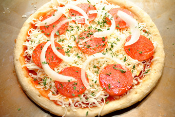 Whole Raw Pepperoni Pizza with Onions