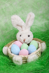Easter basket with decorated eggs and the Easter bunny
