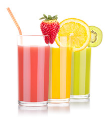 tasty summer fruits with juice in glass