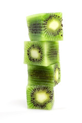 Tower of cubes of kiwi on a white background
