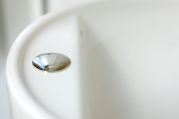 An abstract detail of a contemporary wash-hand basin