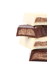 Stack of black and white chocolate bar.