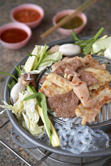 pork and vegetable grill on table