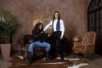 Couple men in the image of African lions