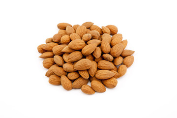 Heap of almonds isolated on white background.
