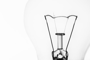 Light bulb macro with the filament wire and construction artisti