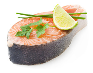 fresh salmon fillet with parsley and lemon slices