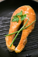 salmon steaks in the iron pan